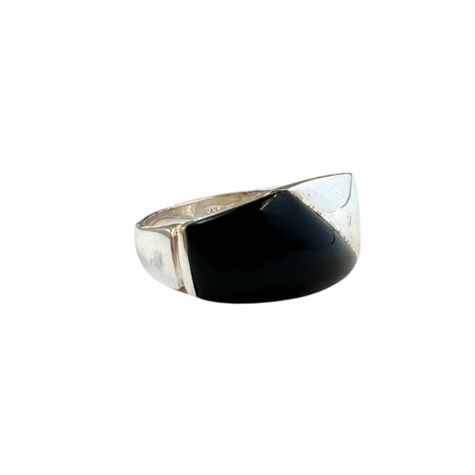 Sterling silver ring with angle cut black onyx in the middle.
