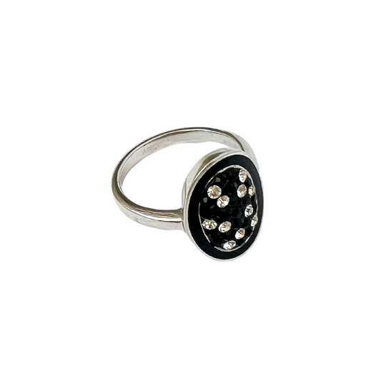 Sterling silver ring with black and clear cubic zirconias.