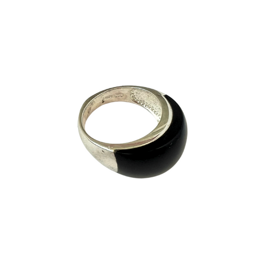 Sterling silver ring with black onyx in the middle.
