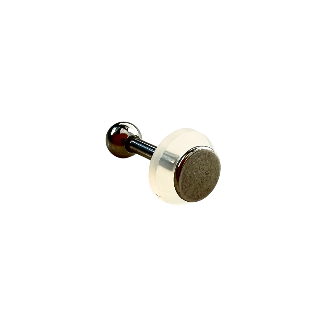 Medical Grade Silicone Disc shown on the back of a labret.