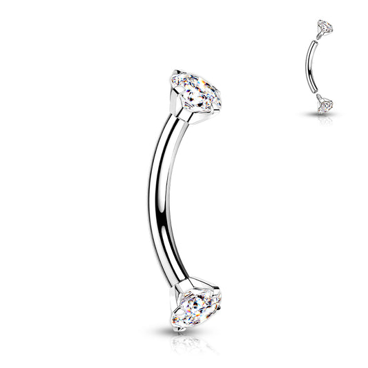 Implant grade titanium curved barbell with internally threaded prong-set clear gems on each end. These curved barbells are perfect for eyebrow, rook or daith. 16 Gauge X 8mm X 3mm. Ti-6AL4V-ELi ASTM F-136 TITANIUM.