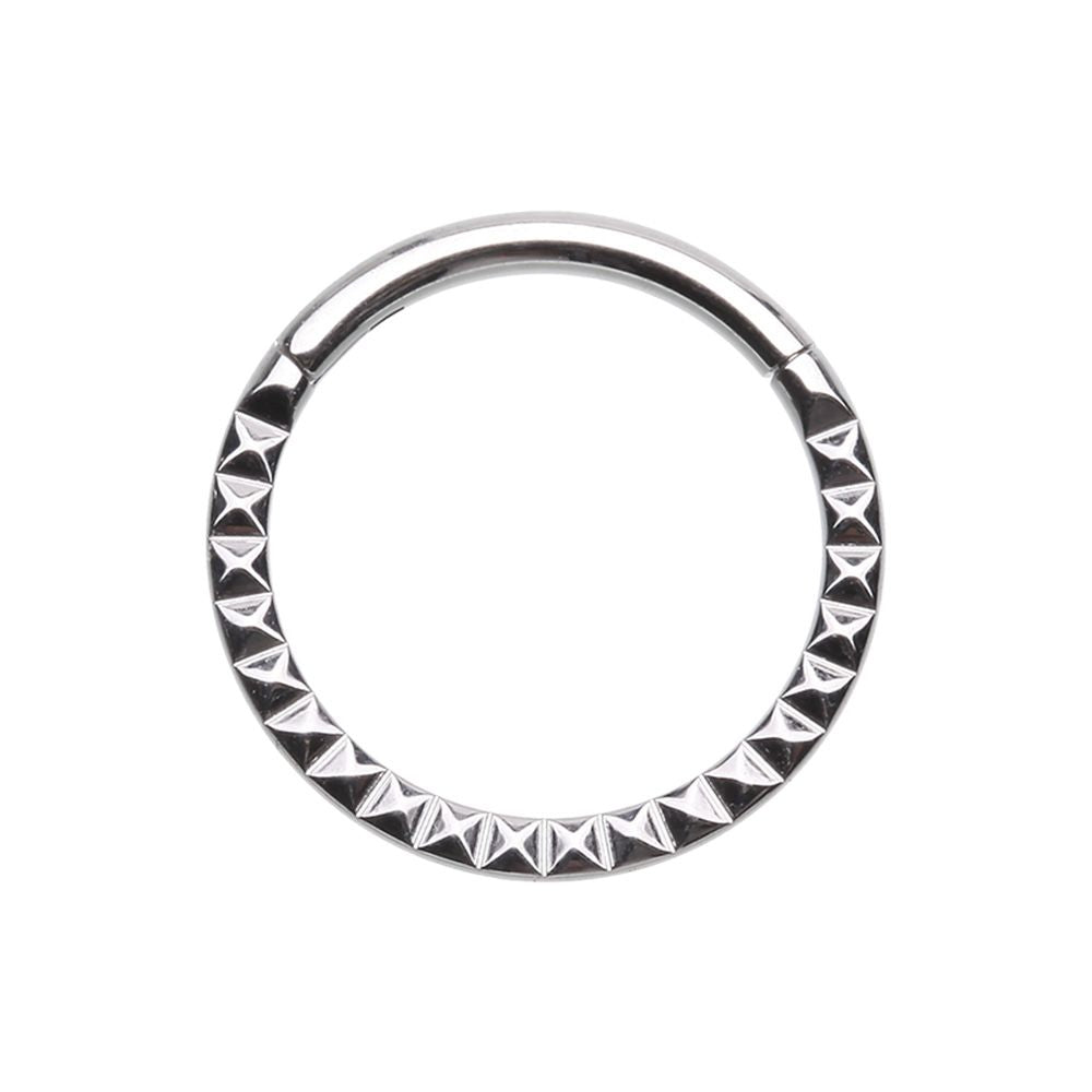 Hinged segment clicker. 316L Surgical steel with angled cut design that catches the light. The rounded top of this hinged clicker makes it a great piece of jewellery for septum, daith, tragus, or rook piercings.