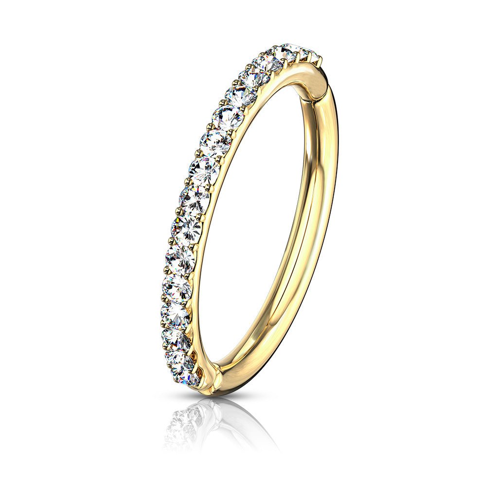 14 Karat yellow gold hinged clicker with 7 prong-set cz side facing gems. Choose either front facing or side facing gems in yellow gold or white gold. Available in 16 Gauge X 8mm, 16 Gauge X 10mm or the very small 16g X 6mm. Autoclave not recommended.