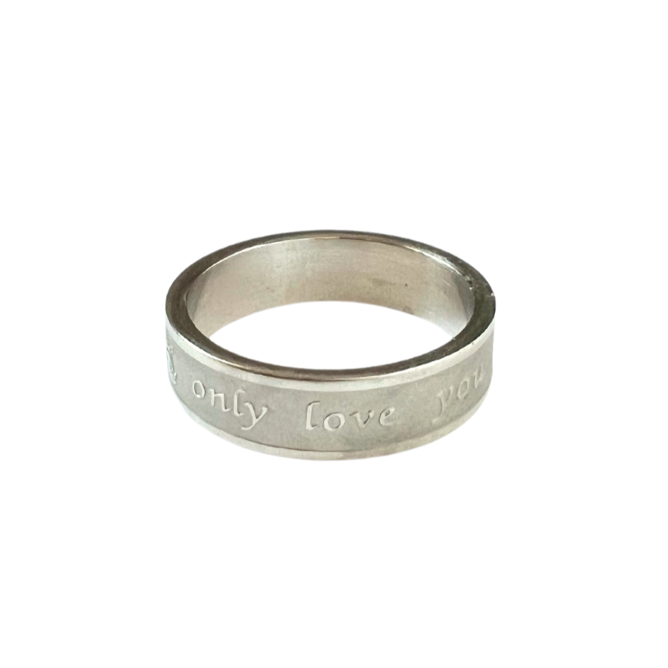 Stainless steel ring with "only love you" embossed design.