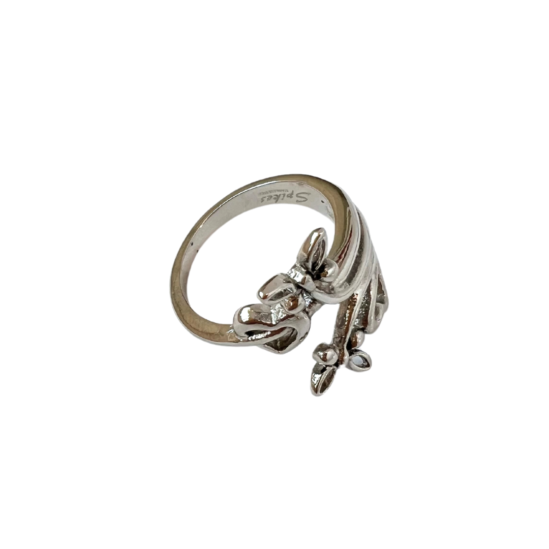 Stainless steel ring with butterfly and hearts.