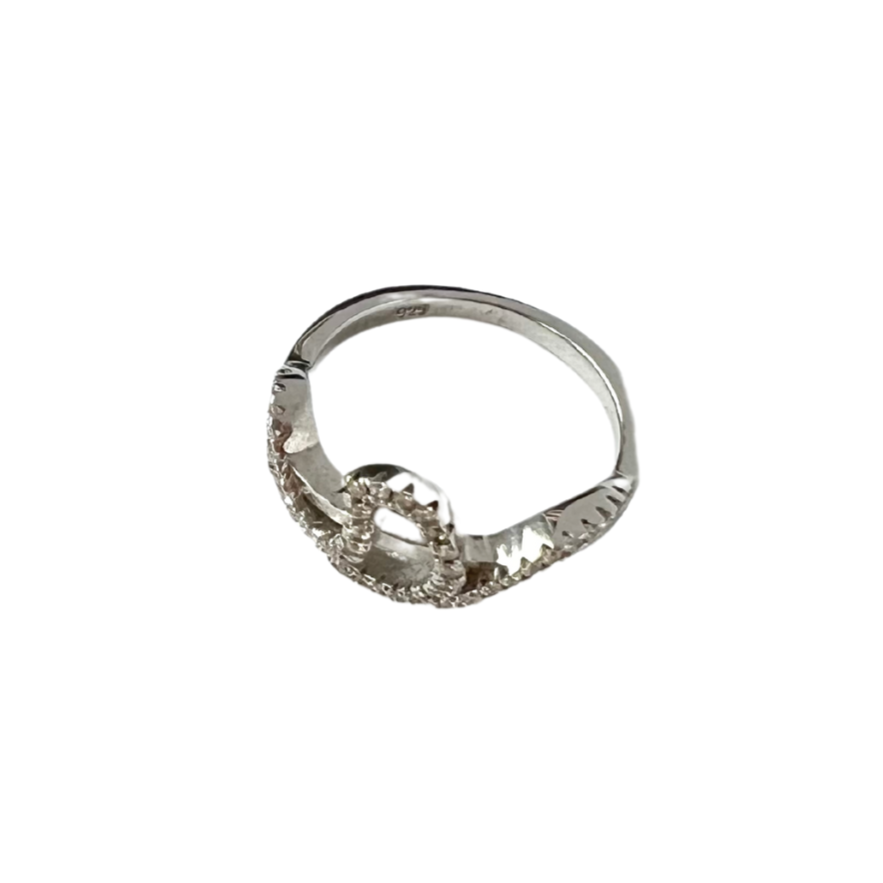 Sterling silver ring with cubic zirconia squiggle design.