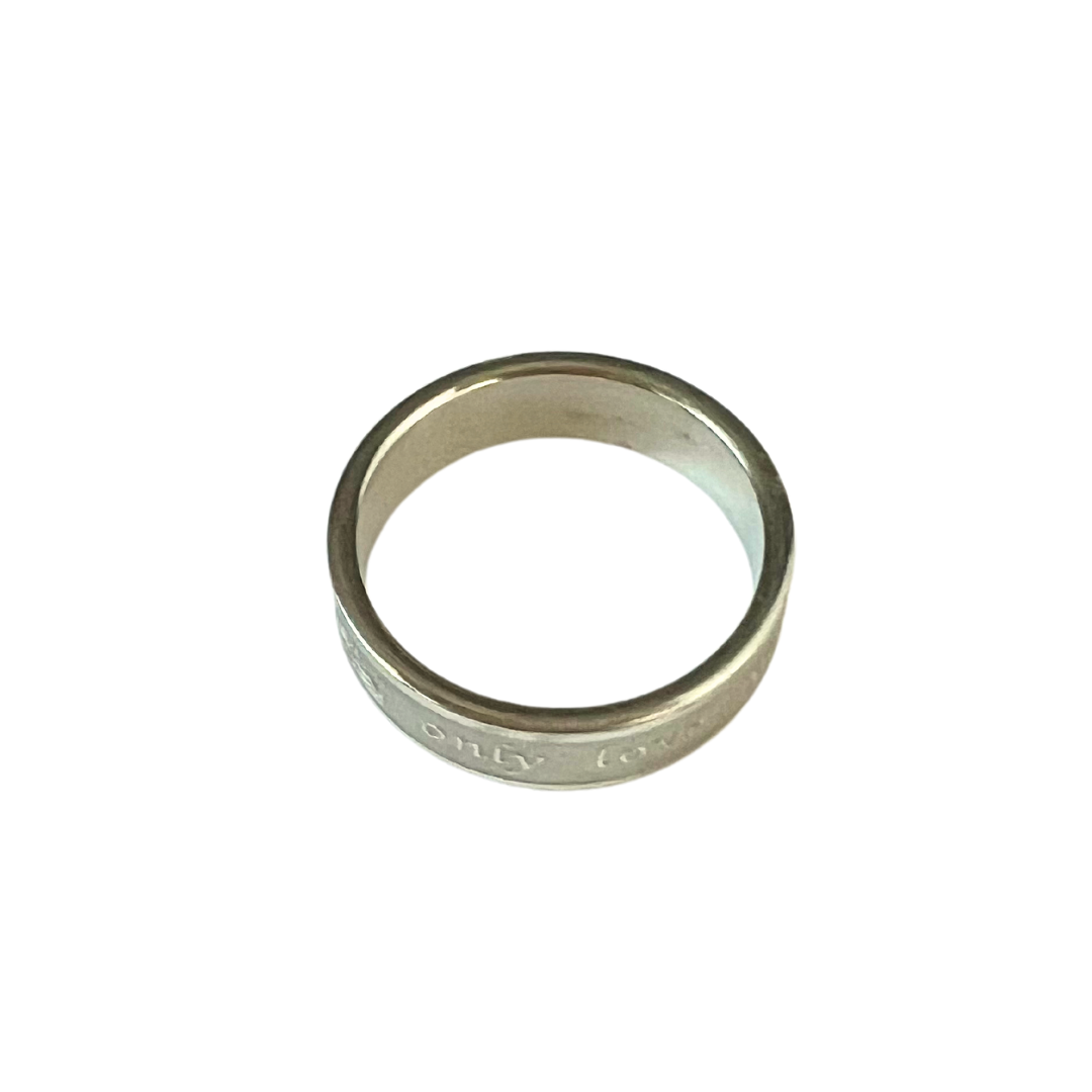 Stainless steel ring with "only love you" embossed design.