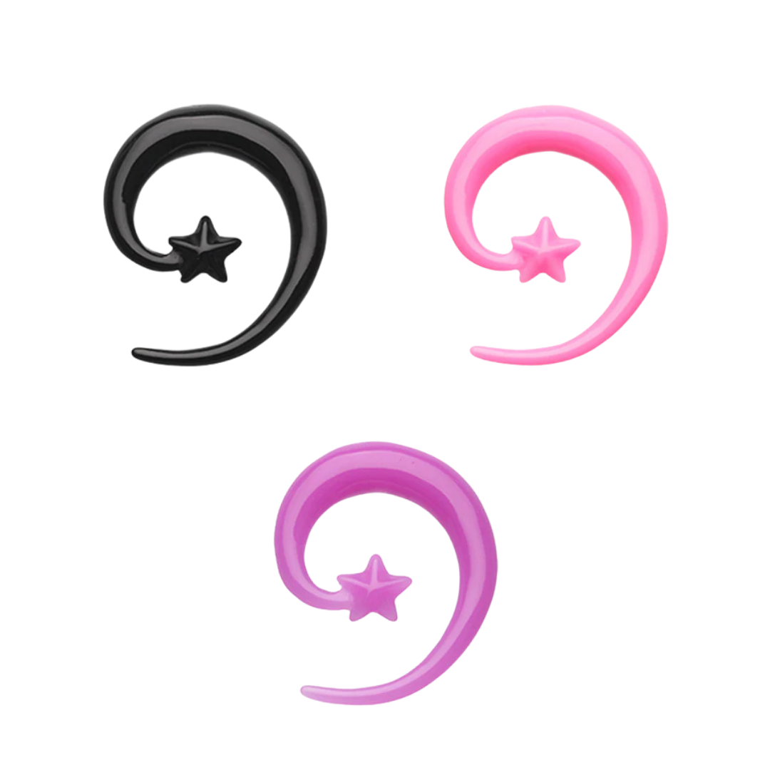 Three acrylic spiral ear taper expanders with a star accent in the center on a white background, shown in black, light pink, and purple colours.