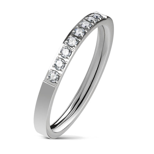 Stainless steel band ring with inlay of 8 cubic zirconia gems.