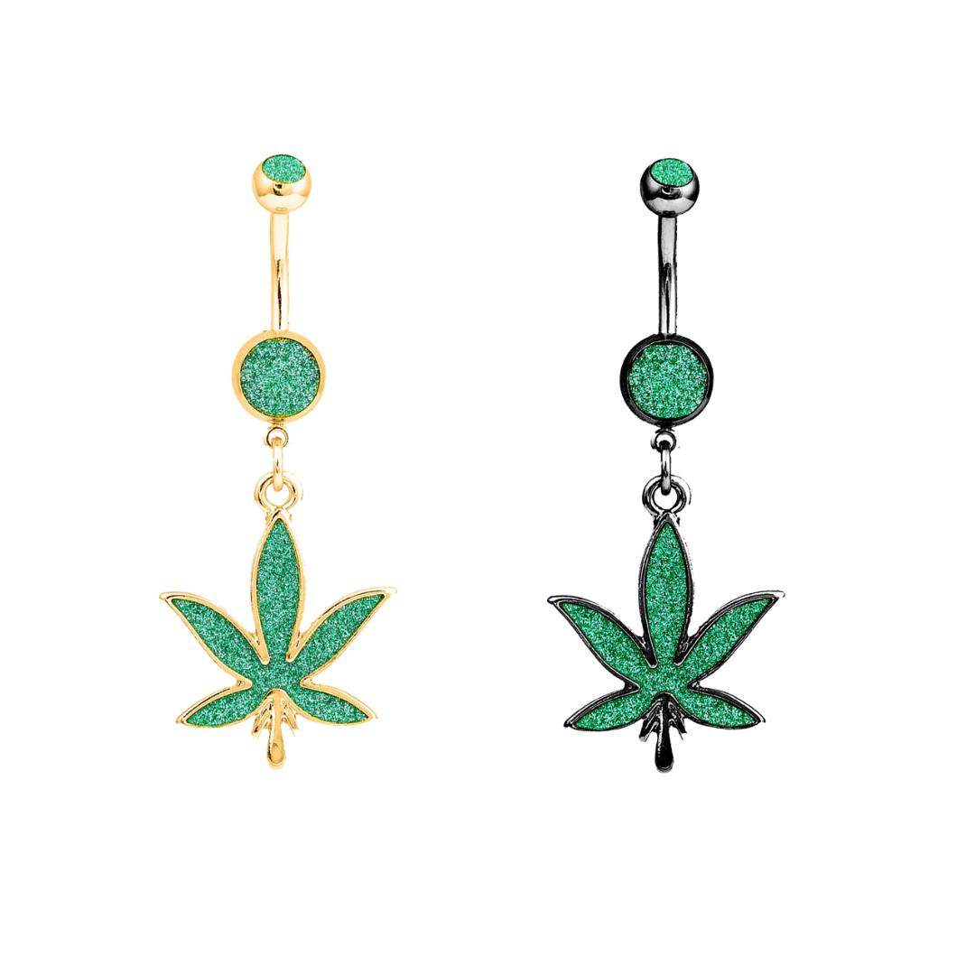 A pair of 316L surgical steel dangling cannabis leaf belly button rings shown side-by-side, featuring a PVD gold-plated option and a silver option, both accented with vibrant green glitter inlays.