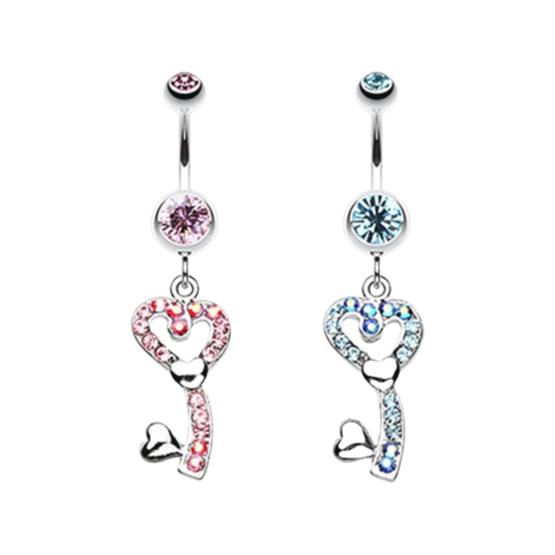 Two surgical steel belly rings with dangling key charms, one accented with pink rhinestones and the other with light blue rhinestones, shown on a plain white background.