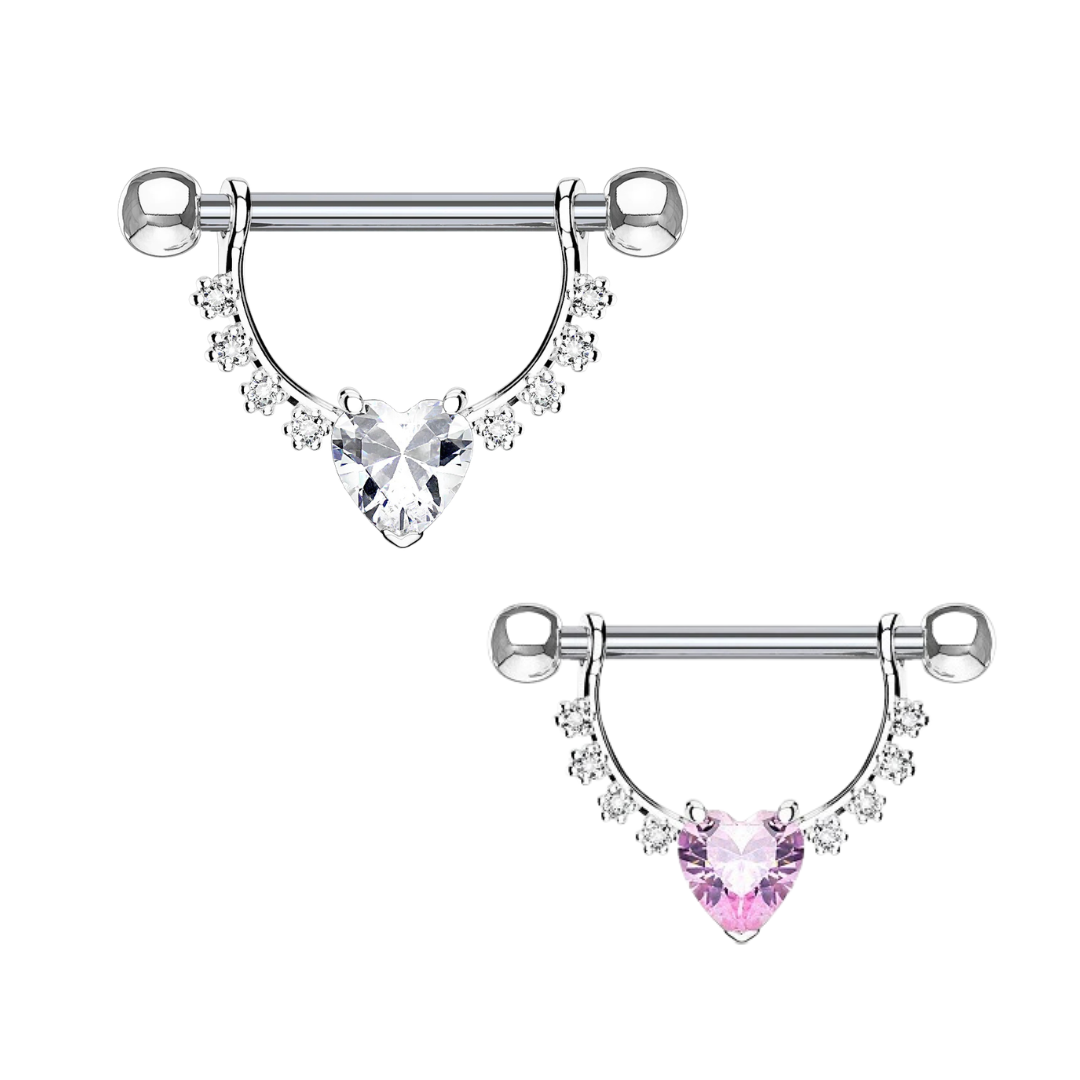A pair of surgical steel straight barbell nipple rings with a dangling crescent shield design, featuring a large prong-set heart-cut cubic zirconia stone in clear white on one and light pink on the other, surrounded by smaller clear gems on a white background.