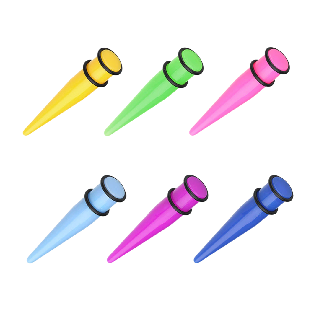 Six colourful neon plastic ear stretching cones in yellow, green, pink, light blue, purple, and dark blue, arranged in two rows on a plain white background.