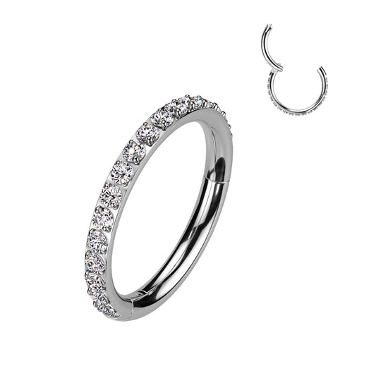 EO Gas sterilized 316L surgical steel hinged segment ring with clear side-facing cubic zirconia. Great for cartilage piercings, lip, eyebrow, ear lobes, or even nostril. These beautiful jewelled clickers look great in the daith, rook, snug, helix or tragus. This product is only available to wholesale customer. Please contact us if you would like to become a wholesale customer.