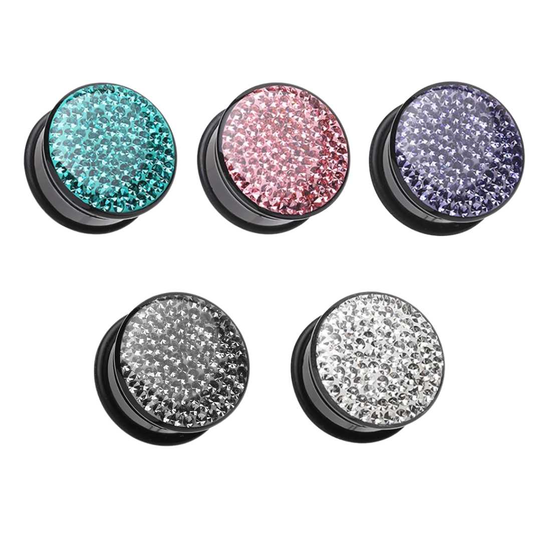 Five round black tiffany plug earrings with rhinestone-covered tops in teal, pink, lavender, silver, and white, arranged on a plain white background.