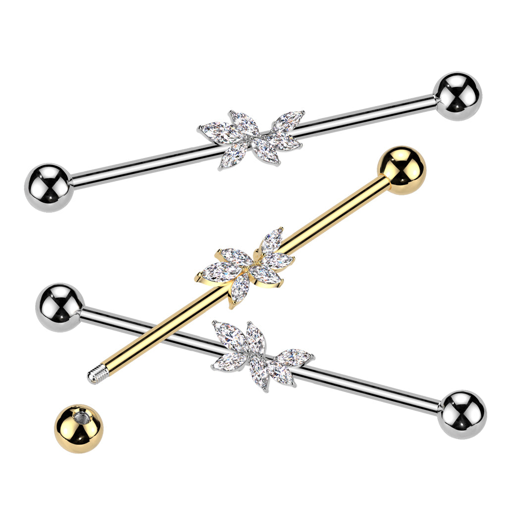 A collection of  gold plated and stainless steel  industrial barbell piercing featuring a marquise-cut crystal leaf design.