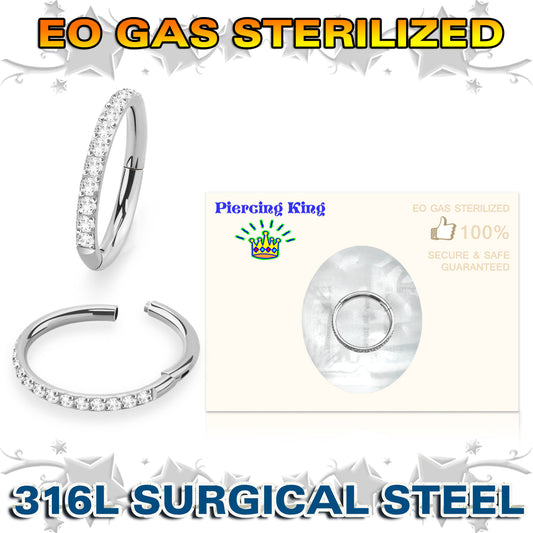 EO Gas sterilized 316L surgical steel hinged segment ring with clear side-facing cubic zirconia. Each piece is individually wrapped, and labelled with the size, date of manufacture, lot number, and expiry date. Great for cartilage piercings, lip, eyebrow, ear lobes, or even nostril. These beautiful jewelled clickers look great in the daith, rook, snug, helix or tragus. This product is only available to wholesale customer. Please contact us if you would like to become a wholesale customer.
