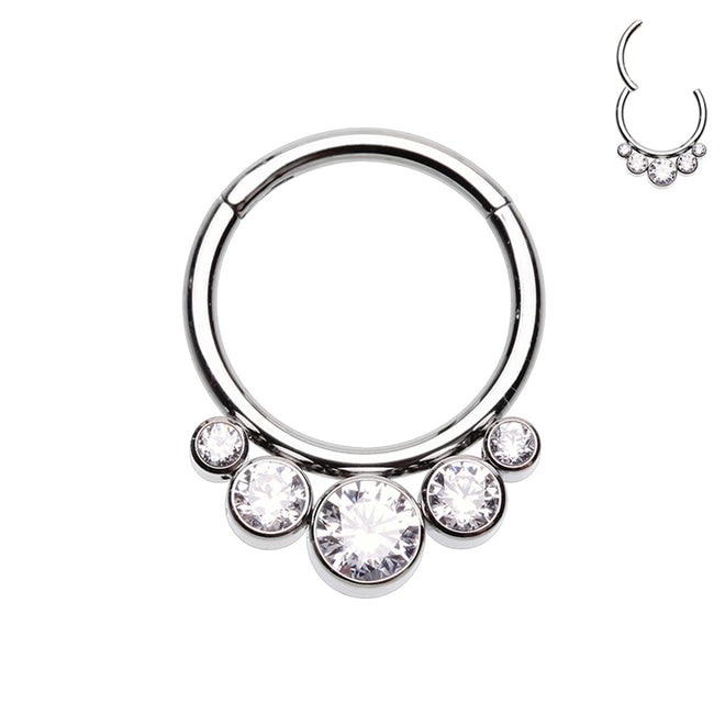 Elegant hinged segment clicker. 316L Surgical steel with 5 clear gems in cascading sizes.  The rounded top of this hinged clicker makes it a great piece of jewellery for septum, daith, tragus, or rook piercings.