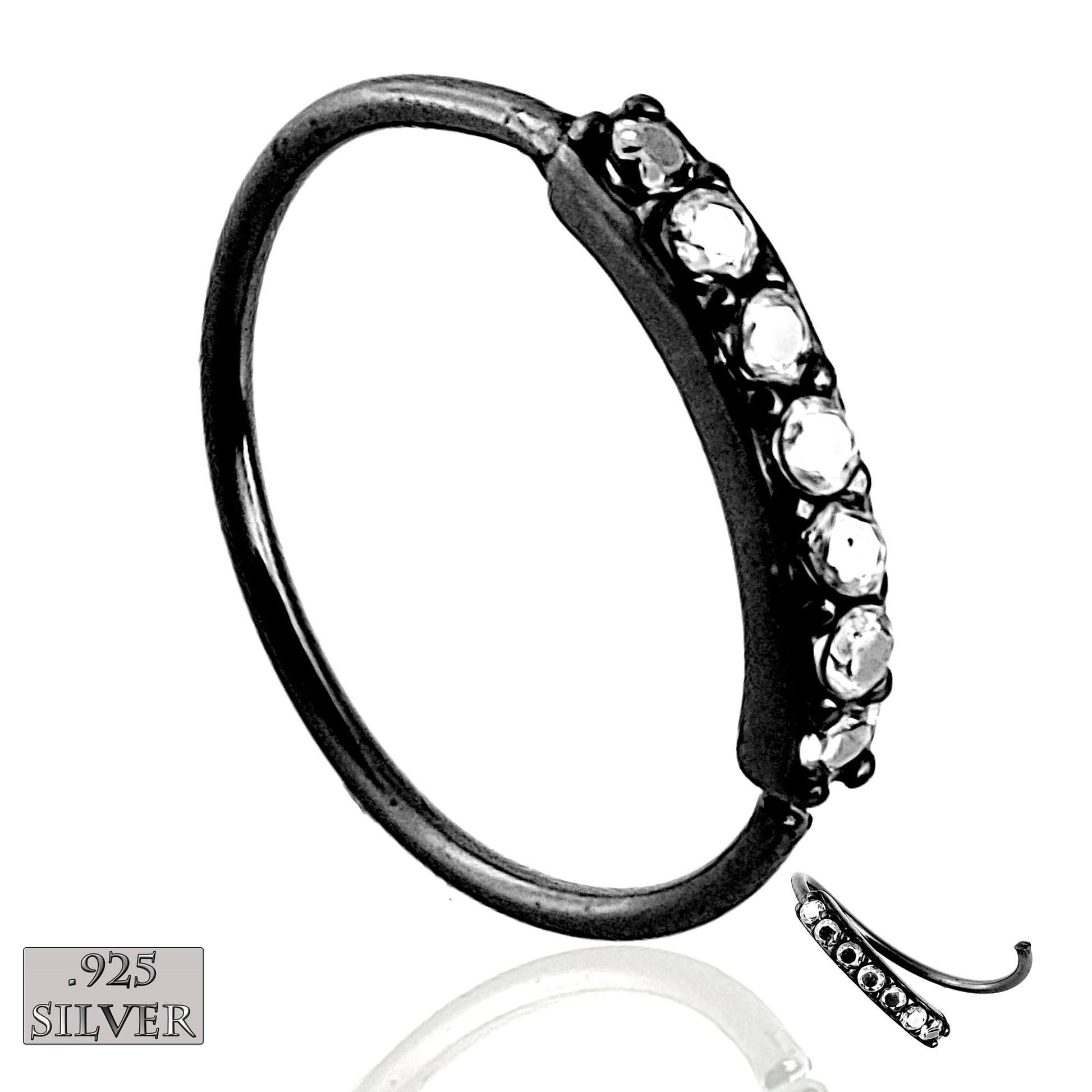Black sterling silver nose hoop with 7 clear prong-set cz gems. 22 Gauge X 8mm. Just twist open the hoop to insert it in your nose, and twist the hoop back closed. 