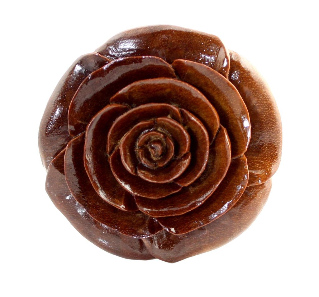 Top view of arang wood plug with a gorgeous carved flower.  