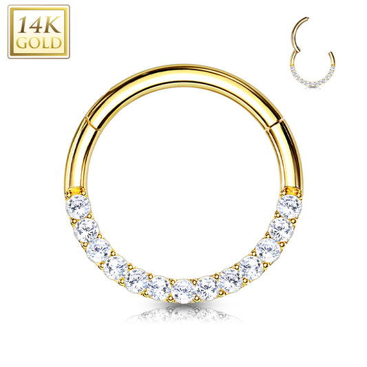 14 Karat yellow gold hinged clicker with 7 prong-set cz  front facing gems. Choose either front facing or side facing gems in yellow gold or white gold. Available in 16 Gauge X 8mm, 16 Gauge X 10mm or the very small 16g X 6mm. Autoclave not recommended.