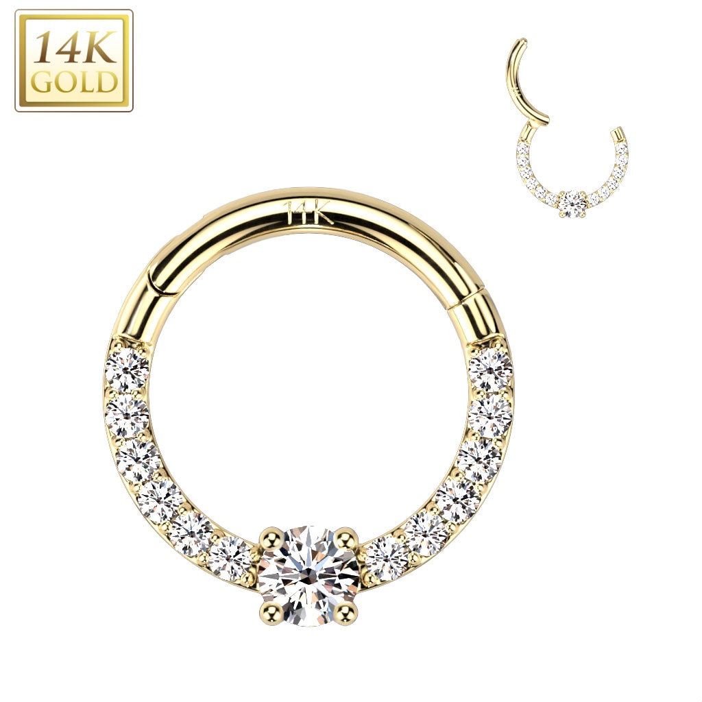 14 Karat gold hinged clicker with elegant cubic zirconia round gem, surrounded by smaller cz gems. Can be used for septum, daith, rook, tragus, or any other cartilage piercings, etc. 16 gauge X 8mm or 16 gauge X 10mm.