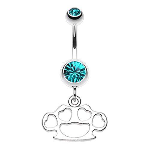A stainless steel belly ring featuring brass knuckle charms and blue gem detailing.