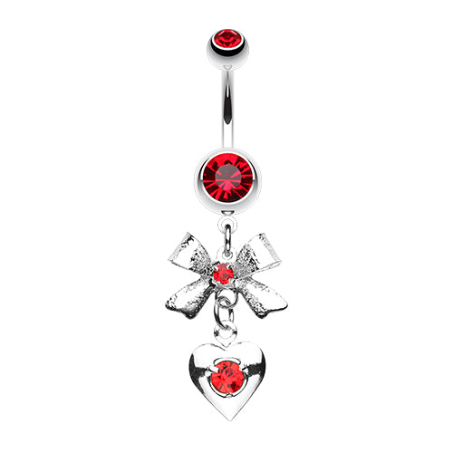 A surgical steel heart and bow belly ring with pink gemstones