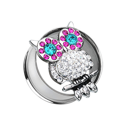 A rhinestone owl ear gauge tunnel plug.
