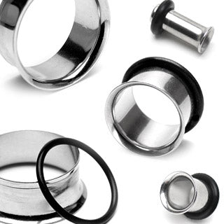 A selection of surgical steel single flare tunnels for body piercing, displayed in various sizes with expansion tools and O-rings.