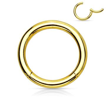 A gold plated  hinged segment ring