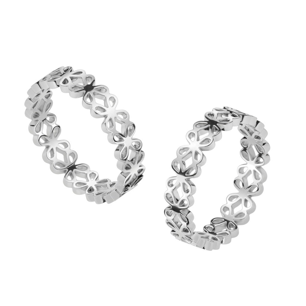 Stainless steel rings featuring a four-leaf or daisy flower cut-out design.