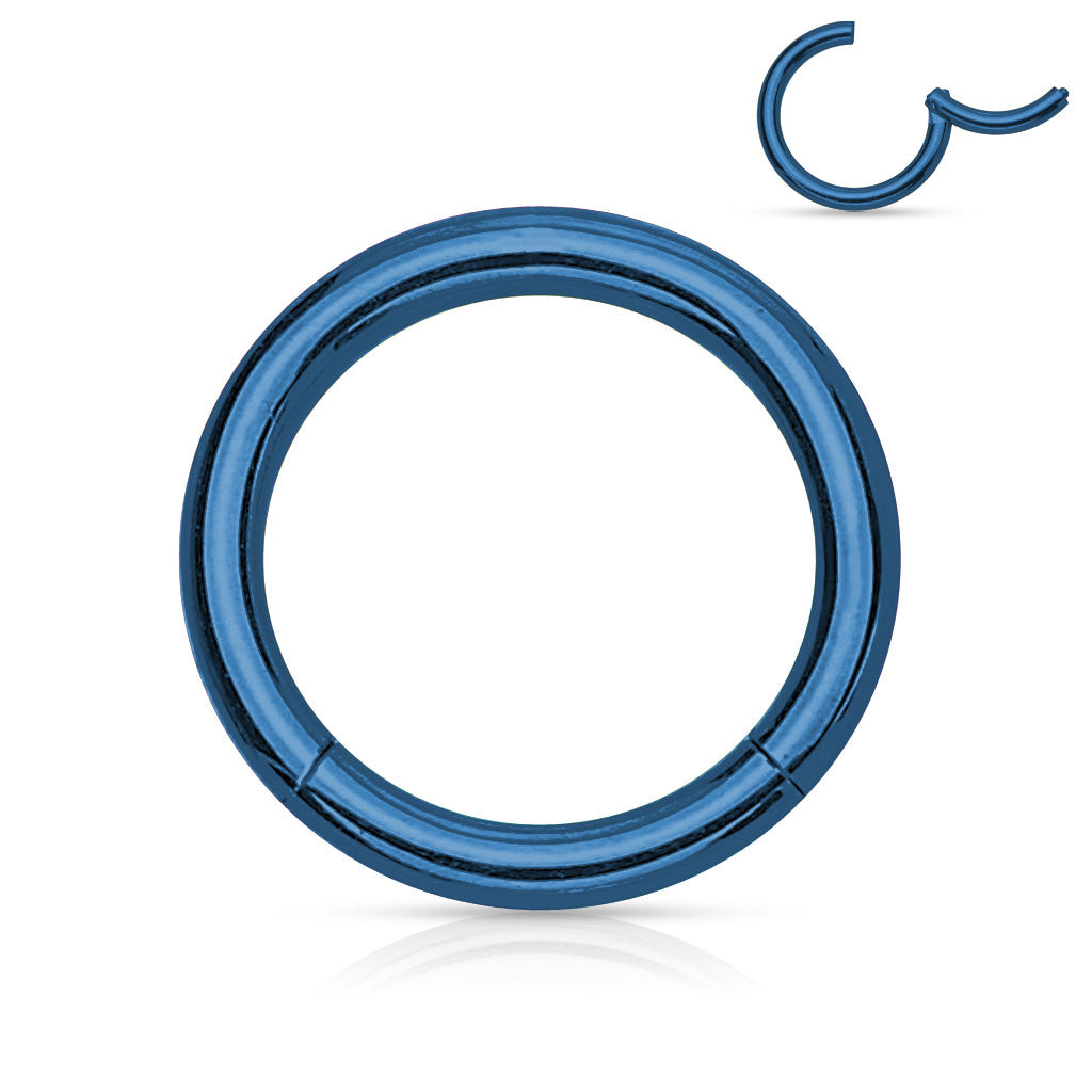A blue
 surgical steel hinged segment ring for piercings.