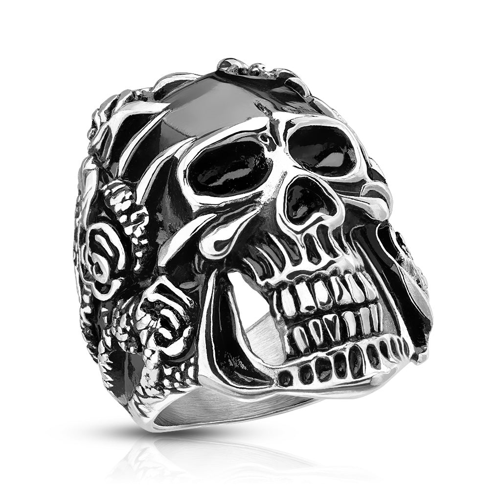 Stainless steel black skull grasped by a claw.