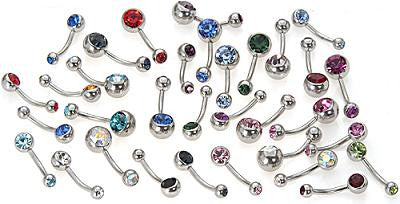 A collection of assorted surgical steel belly button rings with multi-colored double gems.