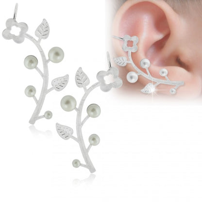  Gorgeous surgical steel earrings with faux-pearl and flower design. These earrings extend or crawl up the ear, and have a regular butterfly backing, and are secured at the top of the earring with a bendble cuff. 316L surgical steel. Image of a model ear wearing the earring.