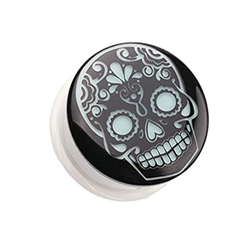 Acrylic tunnel plugs with glow in the dark sugar skull design in black background,