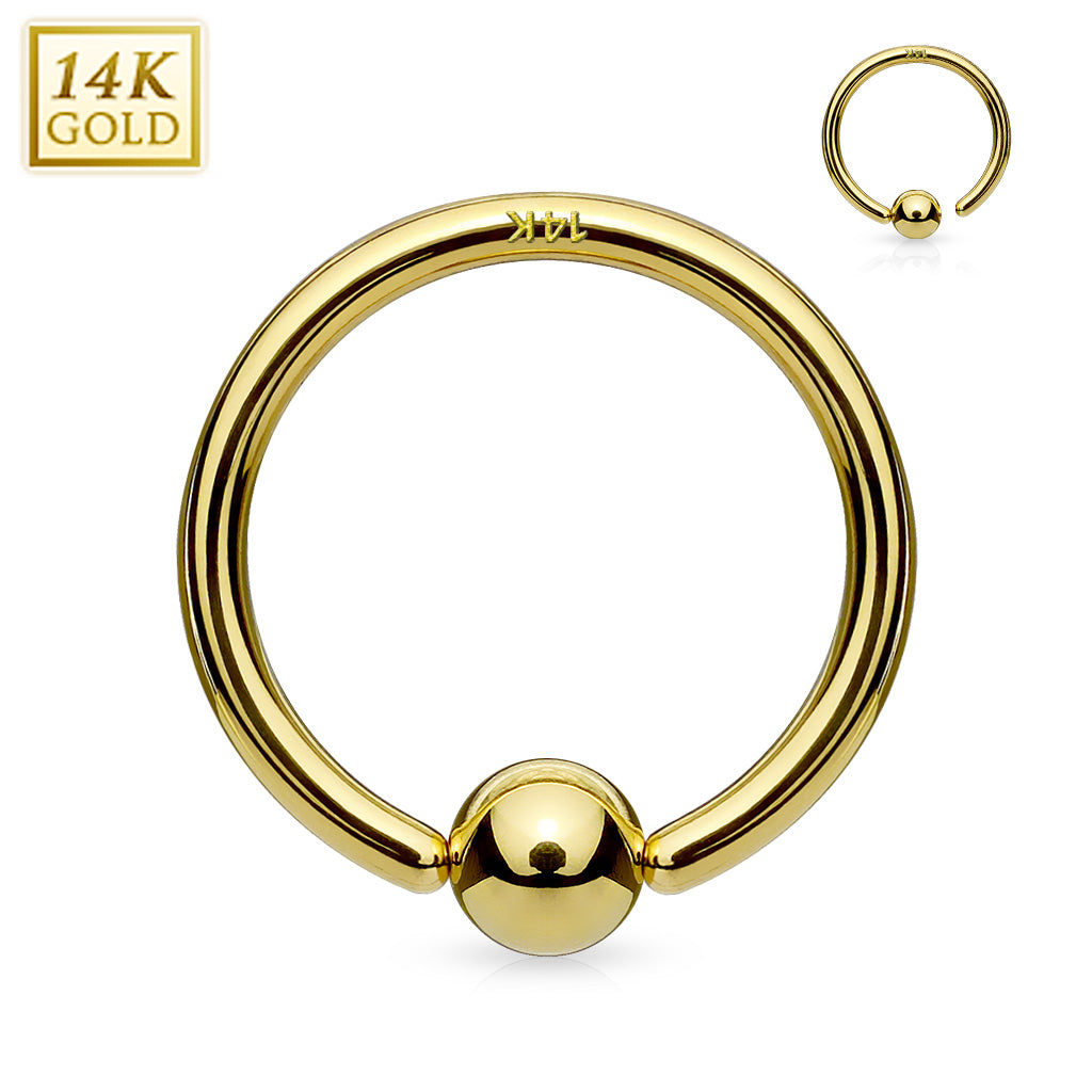 14 Karat gold nose captive bead ring, with ball attached to the post on one side so you never lose the ball! Just twist open to put in, and twist back lining up post and ball to close again.