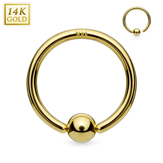 14 Karat gold nose captive bead ring, with ball attached to the post on one side so you never lose the ball! Just twist open to put in, and twist back lining up post and ball to close again.