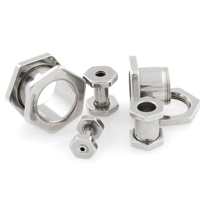 A set of surgical steel hexa tunnels in various sizes with a metallic finish.