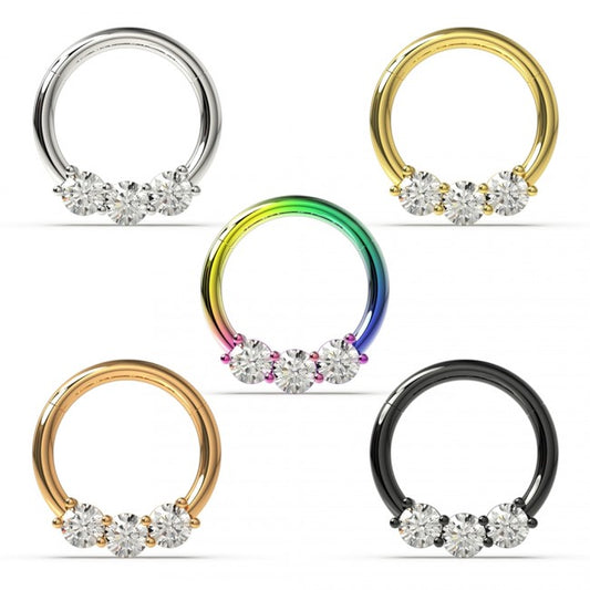 316L Surgical steel hinged segment ring with 3 clear cubic zirconia. Available in 5 colours. These beautiful clickers are great for cartilage, daith, rook, snug, helix or septum piercings.