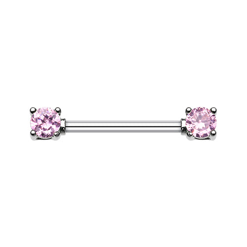 A  pink double gem nipple barbell featuring surgical stainless steel or titanium and cubic zirconia