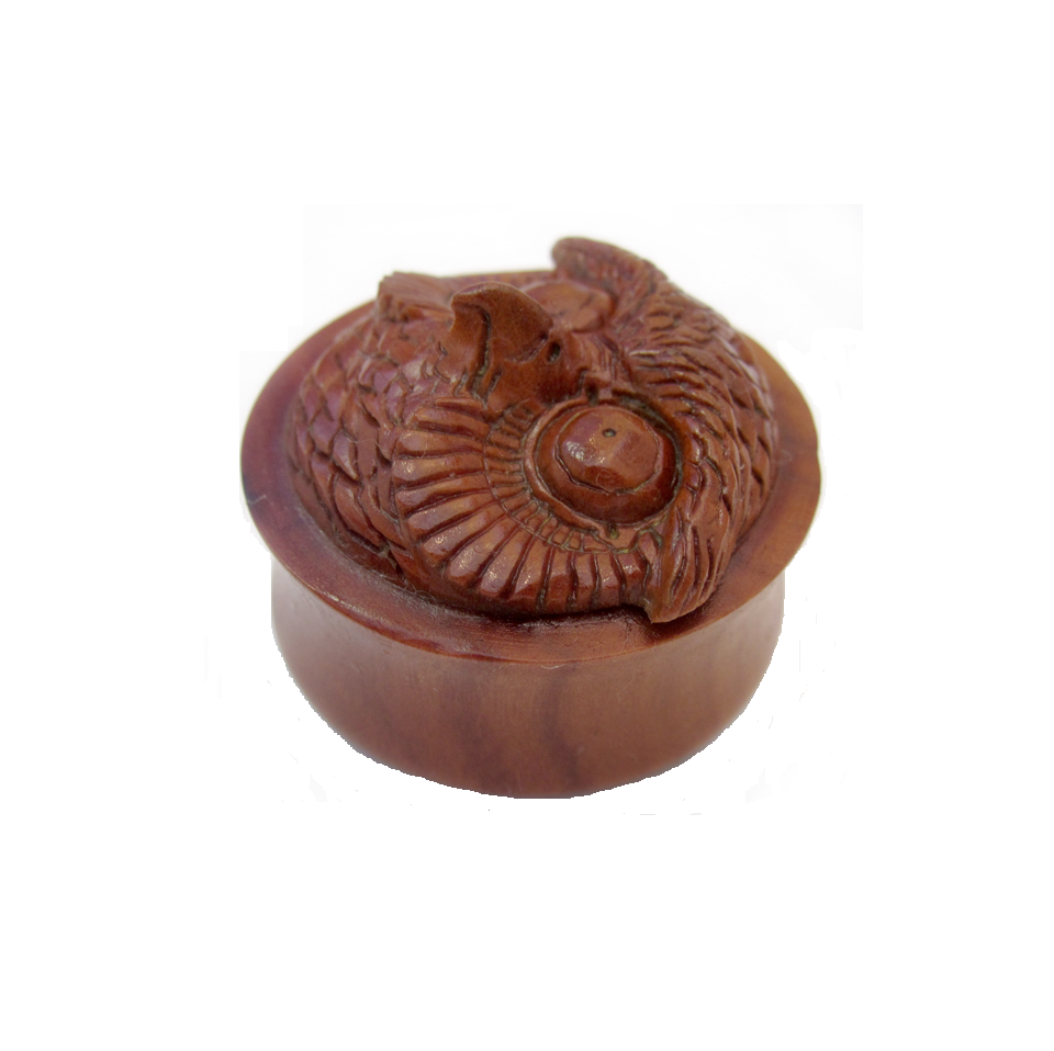 An owl-carved plug often made from Saba or Sawo wood.