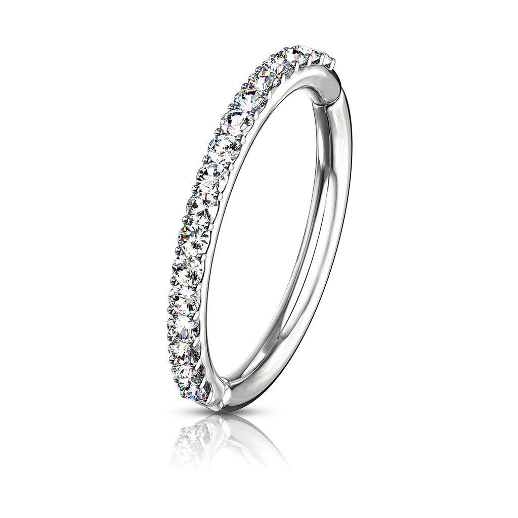 14 Karat white gold hinged clicker with 7 prong-set cz side facing gems. Choose either front facing or side facing gems in yellow gold or white gold. Available in 16 Gauge X 8mm, 16 Gauge X 10mm or the very small 16g X 6mm. Autoclave not recommended.